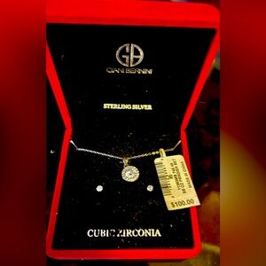 Beautiful earrings small studs and necklace brand new in box  bought at Macy’s